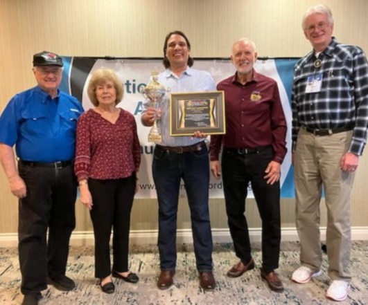 HMC Honors Alex Meixner with Happy Music Ambassador Award at NAA Convention Review